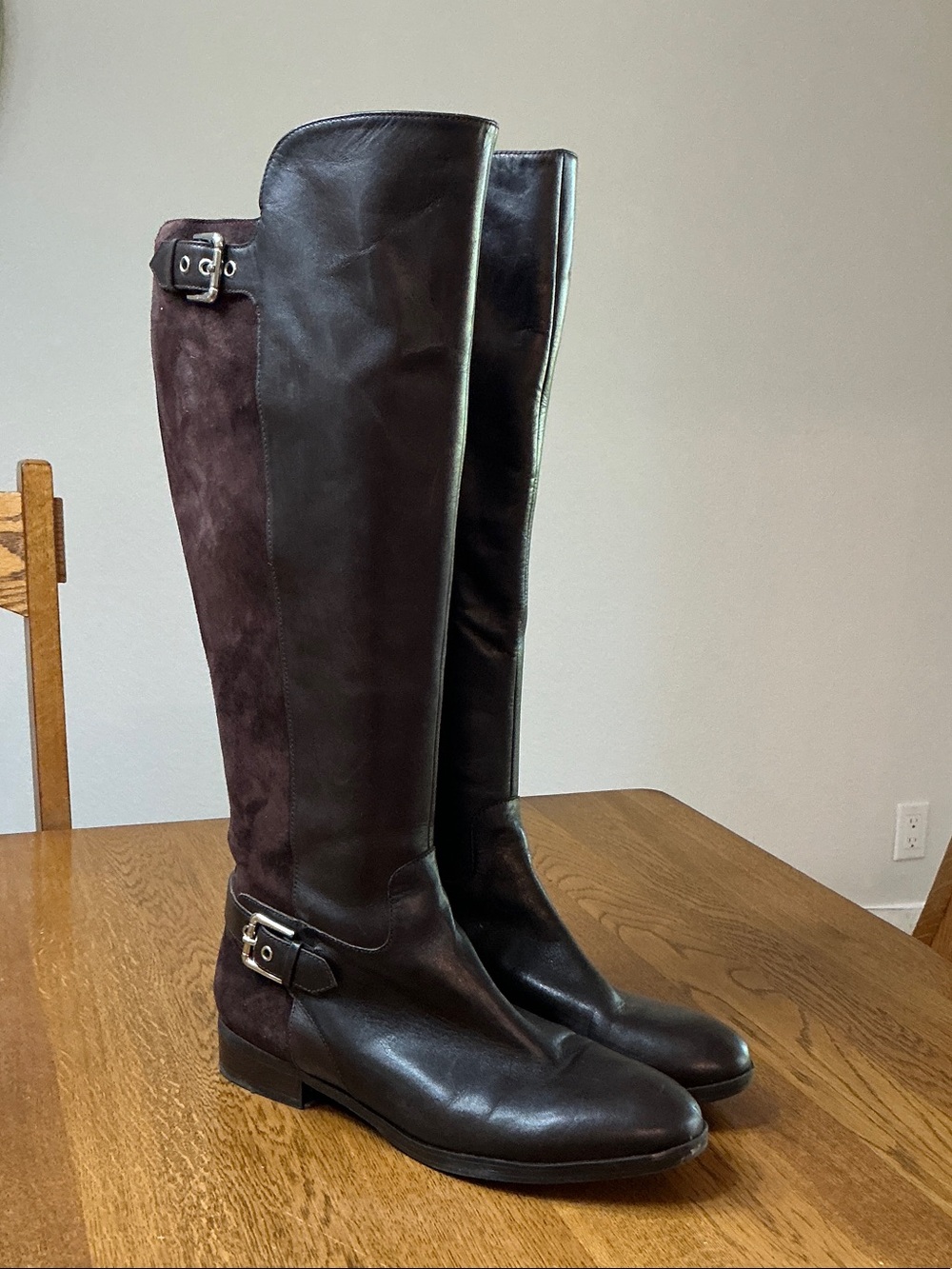 Woman’s Marc Fisher brown smooth/suede leather high boots. Size 9.5 wide calf.